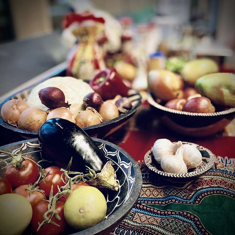 Scrum Cooking Workshop (1) Fresh ingredients and spices arranged on a wooden table for a Scrumkitchen workshop.