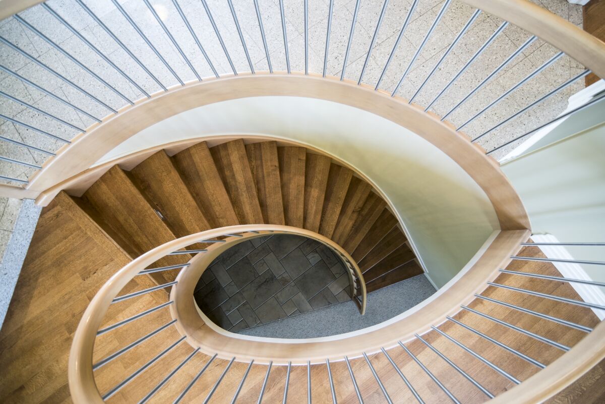 Overhead shot of a modern house wooden spiral staircase